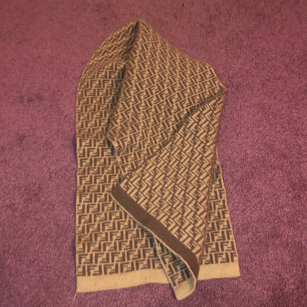 Authentic Fendi scarf with rip (see pics)
